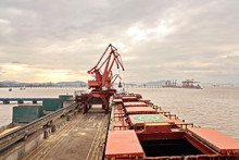Cargo Terminal For Unloading Grain Cargo By Shore Cranes. Port Zhoushan, China. November, 2019.