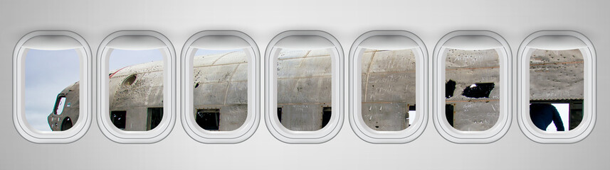 Canvas Print - Airplane windows with aircraft wreckage view. Travel and holiday abstract concept