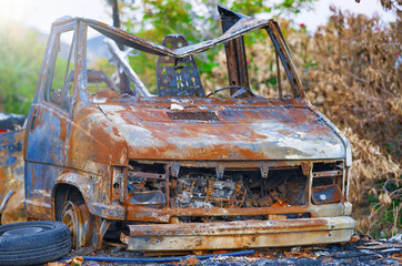 Poster - Car wreckage. Rusty car body, abandoned vehicle