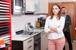 © JackF - Upset girl with husband in kitchen furniture salon