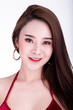 © Sasils Production - Portrait of beautiful thai woman isolated in white background. Happy smile.
