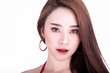 © Sasils Production - Portrait of beautiful thai woman isolated in white background. Sexy mouth.