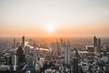 Wall Mural - Aerial view of Bangkok city at sunset, from Mahanakhon SkyWalk, Thailand, Asia