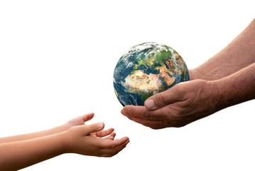 Wall Mural - close up of senior hands giving small planet earth to a child isolated on white background
