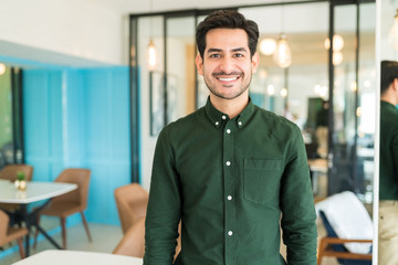 businessman standing in corporate office