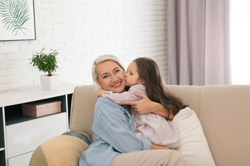 Canvas Print - Happy granddaughter and grandmother together at home