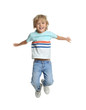 © New Africa - Happy little boy jumping on white background