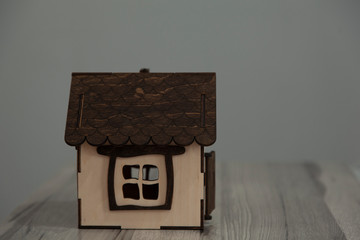 house model with key on desk