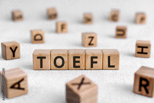 TOEFL - words from wooden blocks with letters, The Test of English as a Foreign Fototapet