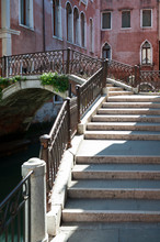 Empty View Of Series Of Arched Stairways Bridging A Canal In Venice, Italy