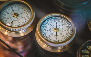 brass metal compass with indicator