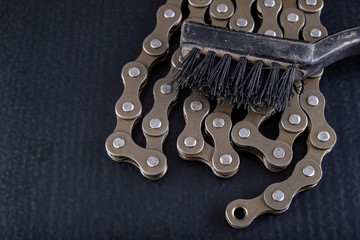 Wall Mural - Bicycle chain and soft brush to clean dirt. Care of the bicycle's drive system.