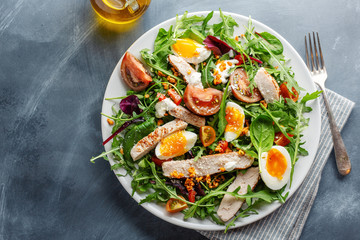 Canvas Print - Fresh salad with turkey, eggs and vegetables