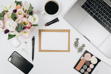 working place of woman, laptop, flowers and accessories