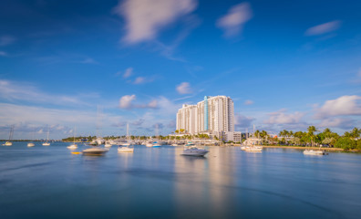 Wall Mural - city water boats horizon sky cloud architecture cityscape panorama blue atardecr river miami florida