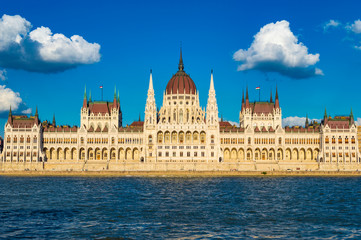 Budapest, Hungary - CIRCA 2013: Hungarian Parliament Building, as photographed from across the Danube; at a bright sunny summer day.