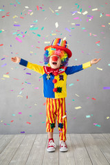 Wall Mural - Funny kid clown playing indoor