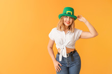 Beautiful Young Woman On Color Background. St. Patrick's Day Celebration