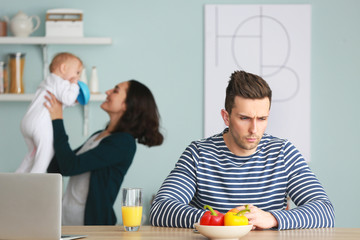 Poster - Happy mother with her baby and young father suffering from postnatal depression at home