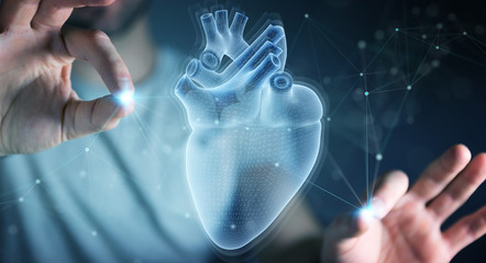 Fototapete - Man using digital x-ray of human heart holographic scan projection 3D rendering