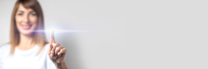 young woman holds a blue marker and writes something on a light background. Added the words Plan A, Plan B. Banner. Concept business, work, strategy
