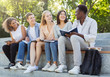© Prostock-studio - Friendly multiethnic students discussing new educational project