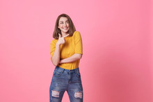 Beautiful Healthy Young Woman Smiling With His Finger Pointing And Looking At On Light Pink Banner Background With Copy Space.