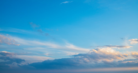 Wall Mural - beautiful bright sunset sky with clouds. nature sky background.