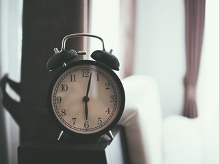 alarm clock on table in the bed room on morning