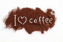 Ground Coffee Sprinkled On A White Table With The Text "I Love Coffee"