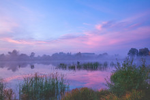 Magic Sunrise Over The Lake. Misty Early Morning, Rural Landscape, Wilderness, Mystical Feeling. Serenity Lake In Magical Light