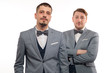 © pavel_shishkin - Two young funny men in formal clothes