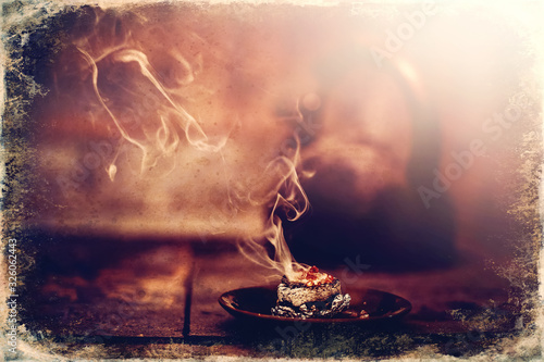 Frankincense burning on a hot coal Wallpaper Mural