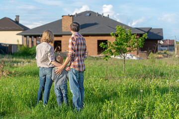 loving couple looking at their home