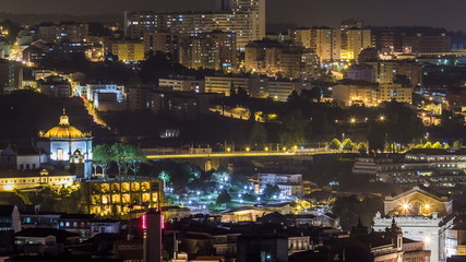 Wall Mural - Rooftops of Porto's old town on spring night timelapse after sunset, Porto, Portugal