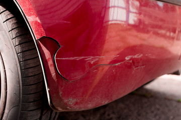 Damage or broken on the back bumper of the car from accident