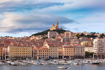 Wall Mural - The old Vieux Port and Basilica Notre Dame de la Garde in the historical city center of Marseilles on sunny day, France