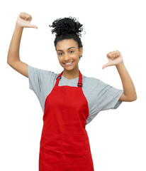 Wall Mural - Happy latin american waitress with red apron