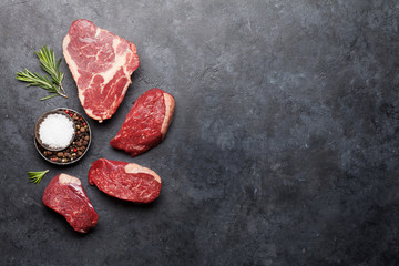 Variety of raw beef steaks