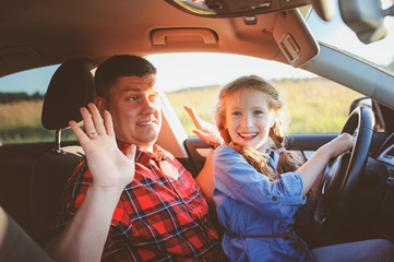 father teaching kid daughter to drive a car, family traveling on summer vacation