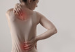 Woman with back pain. Incorrect posture, Scoliosis, . Pain relief concept.