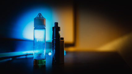 vape black cigarette with liquid bottle