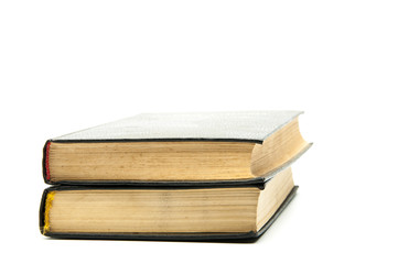 Wall Mural - Closed books on the table .. Bible. On a white background. Stack of books