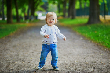 Little girl crying in a park