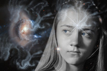 A Young Girl With Blue Eyes And Piercing Gaze Against The Starry Sky. Shining Star In The Forehead-the Concept Of Clairvoyance, Mysticism, Divination. Elements Of This Image Are Provided By NASA.