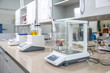analytical scales in a chemical laboratory, good daylight,