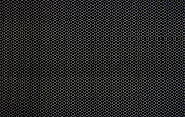creative hole net grate on black background