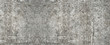 Old gray vintage shabby patchwork tiles stone concrete cement wall texture background banner