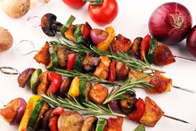 Grilled Pork Shish Or Kebab On Skewers With Vegetables . Food Background Shashlik