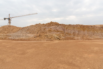 Wall Mural - Earthwork stacked on construction site